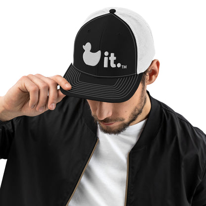 Duck it logo black and white trucker hat male model