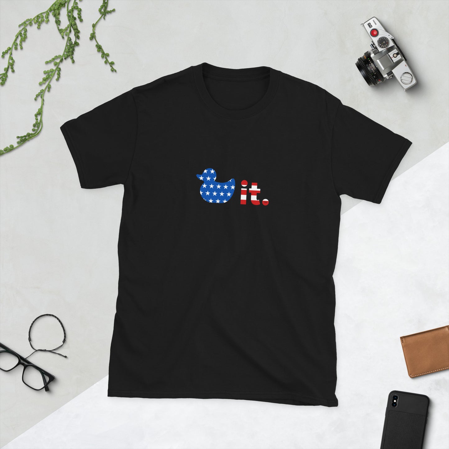 Duck it logo shirt stars and stripes on table